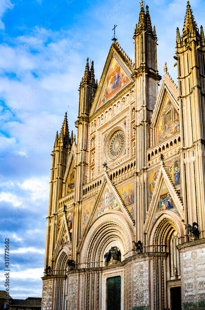 Facade of the Cathedral of Santa Maria Assunta, Duomo of Orvieto in Italian Gothic style.