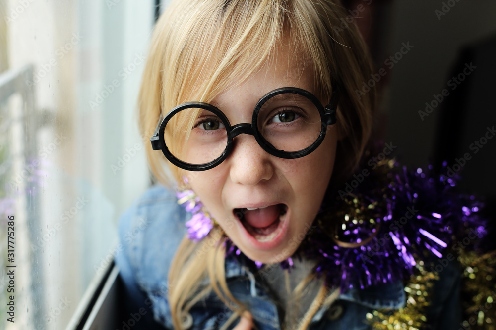 happy emotional child in carnival costume at home happy emotional child in carnival costume at home