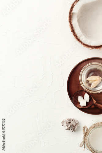 Coconut cosmetics background. Top view