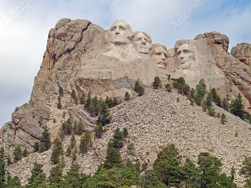 Iconic sculpted Presidential faces of George Washington, Thomas Jefferson, Theodore Roosevelt, and Abraham Lincoln  at the Mt. Rushmore National Memorial, Keystone, South Dakota photo