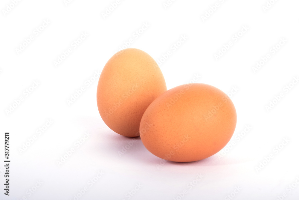 Isolated brown eggs in front of white background Isolated brown eggs in front of white background