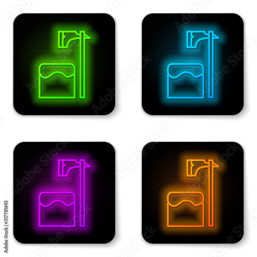 Glowing neon line Executioner axe in tree block icon isolated on white background. Hangman, torturer, executor, tormentor, butcher, headsman. Black square button. Vector Illustration
