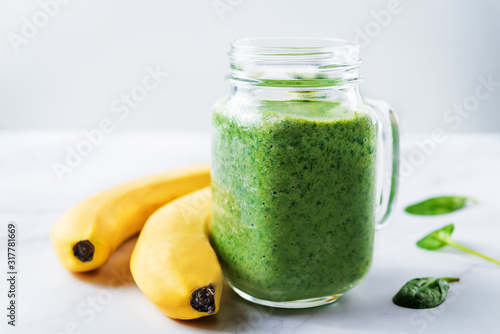 Spinach banana smoothies in glass