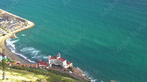 Sea coast with turquoise transparent water in a tourist destination of the hotel. tourist paradise in Gibraltar