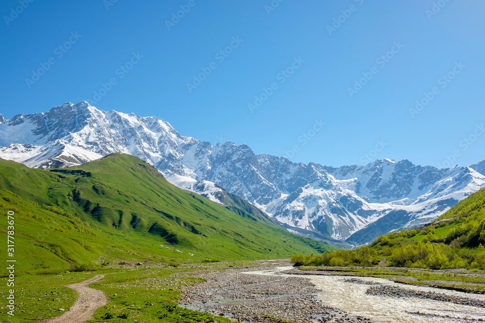 Shkhara peak in the massif known as the Bezingi (or Bezengi) Wall, Ushguli, Samegrelo-Zemo Svaneti region, Georgia Shkhara peak in the massif known as the Bezingi (or Bezengi) Wall, Ushguli, Samegrelo-Zemo Svaneti region, Georgia