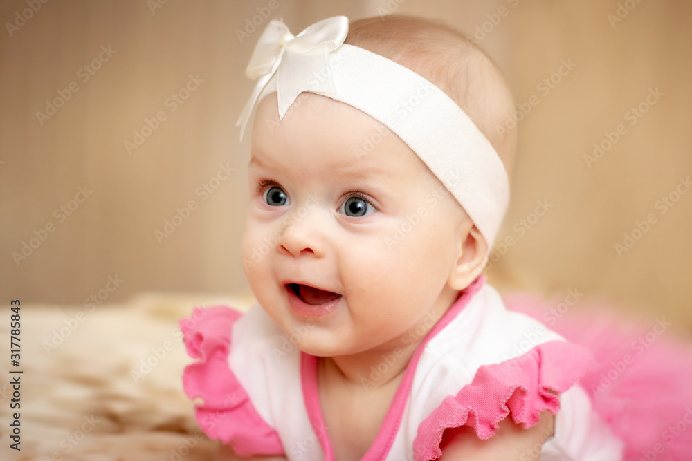 Portrait of a little girl with a happy smile on her face_ Portrait of a little girl with a happy smile on her face_
