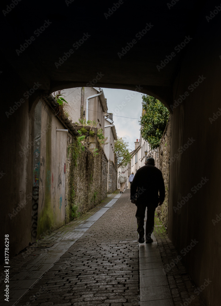 Man in an archway in Ireland 