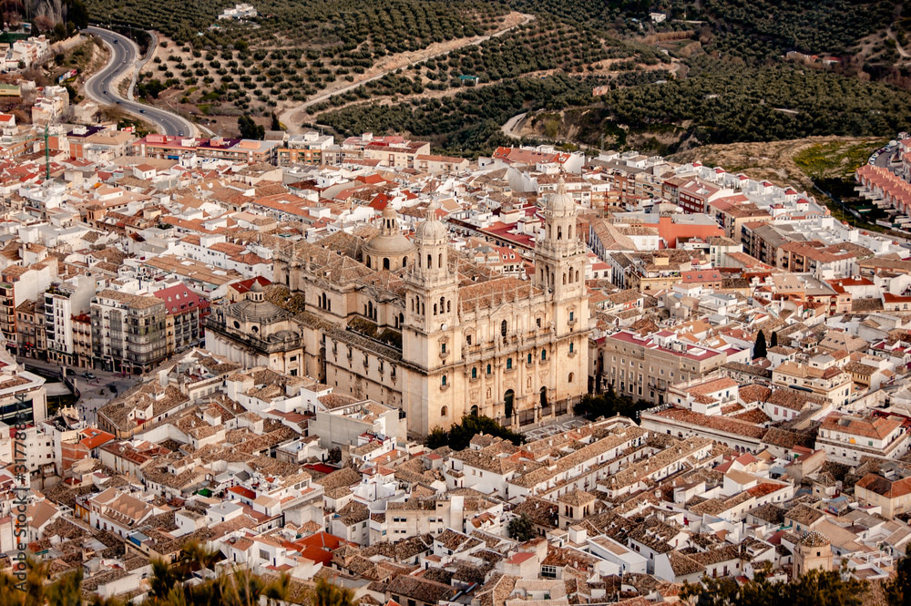 Fototapeta premium Panoramic view of the Cathedral of the Asuncion in Jaén Andalusia from the cross in Castle of Santa Catalina where you can see the city of Jaen and the neighborhood around the monument