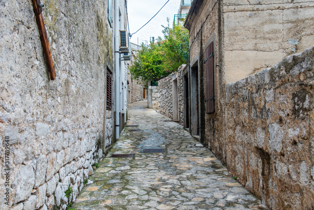 Narrow street in the fishing village, Murter, Croatia, Europe