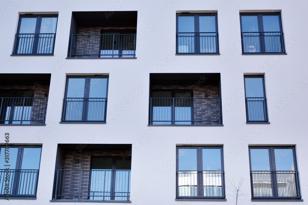 Modern and new apartment building. Multistoried, modern, new and stylish living block of flats. Modern and new apartment building. Multistoried, modern, new and stylish living block of flats.