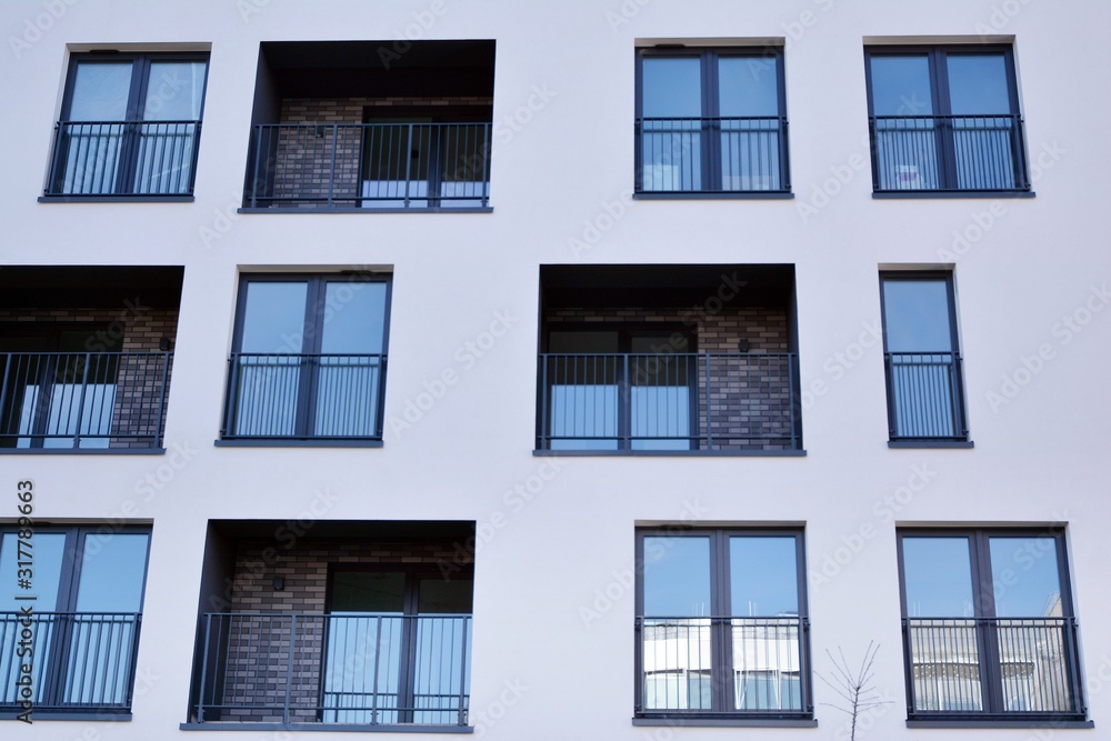 Modern and new apartment building. Multistoried, modern, new and stylish living block of flats.