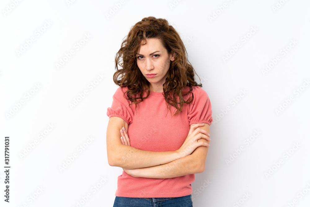 Young pretty woman over isolated background feeling upset Young pretty woman over isolated background feeling upset