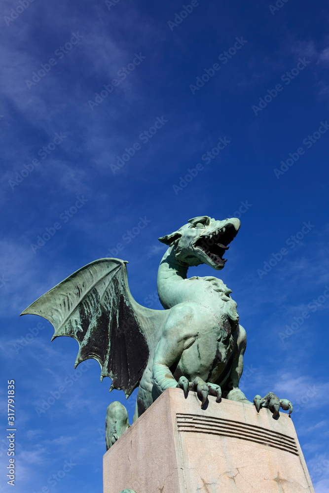 Dragon statue on the Dragon Bridge in Ljubljana, Slovenia