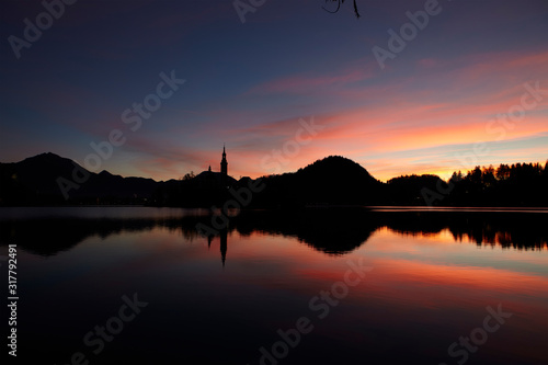 Lake Bled and the small island in the middle at sunrise  Bled  Slovenia