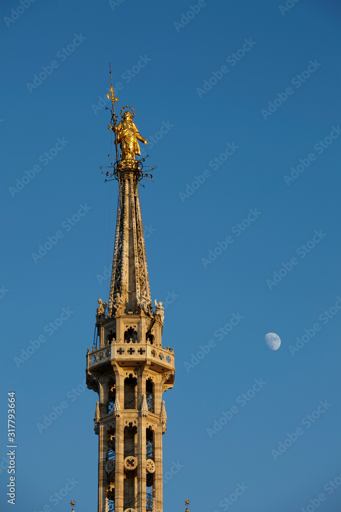 Our Lady statue, called Madonnina, on the top of the Cathedral, Milan, Italy Our Lady statue, called Madonnina, on the top of the Cathedral, Milan, Italy