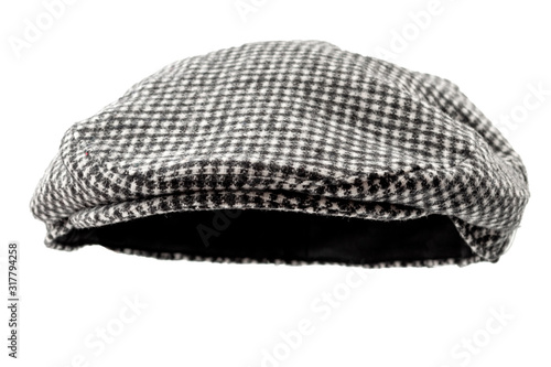 Floating grey hunting tweed flat cap or newsboy cap isolated on white background with clipping path cutout using ghost mannequin technique