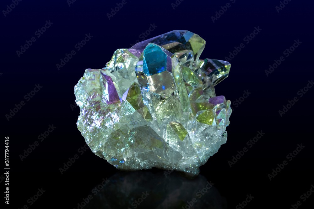 Titanium rainbow aura quartz crystal cluster.Close up
