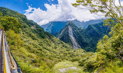 Panoramic view over the jungle from the Zhongbu Cross Island Highway on Taiwan in summer photo