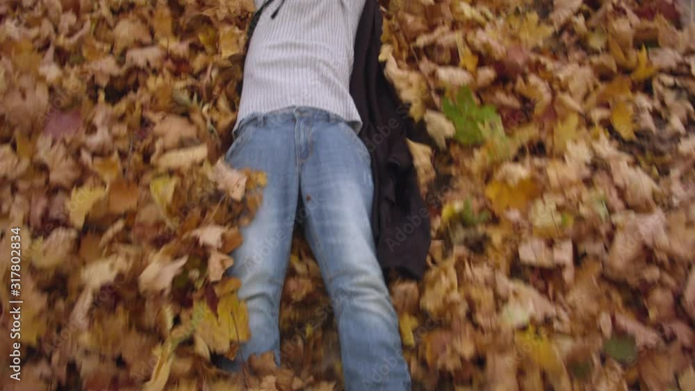 Boy with mom in halloween costumes play in the autumn forest. Recorded in Raw on Blackmagic camera. Boy with mom in halloween costumes play in the autumn forest. Recorded in Raw on Blackmagic camera.