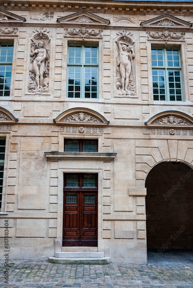 Exterior facade of a Parisian building, Paris France