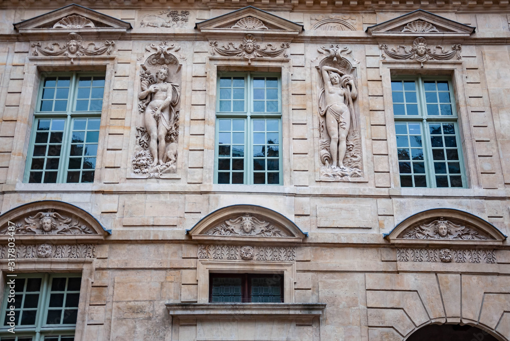 Exterior facade of a Parisian building, Paris France