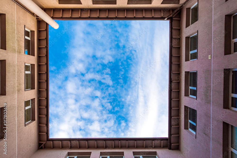 Blue sky framed by walls Blue sky framed by walls