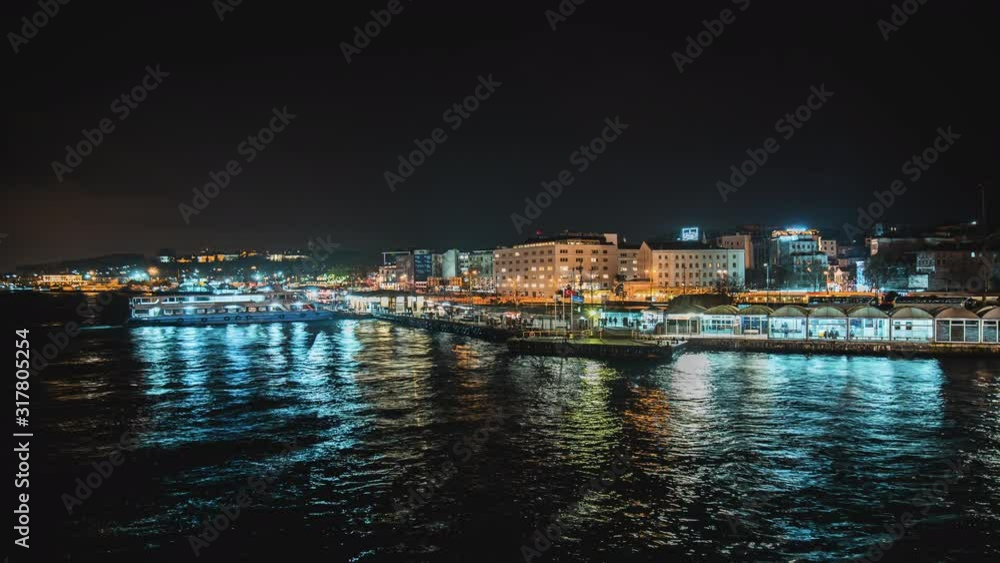 Istanbul Eminonu Pier Time Lapse during night time with sea traffic Istanbul Eminonu Pier Time Lapse during night time with sea traffic