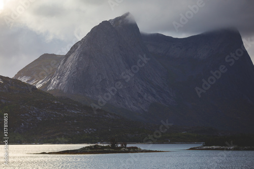 Classic Norwegian cold panoramic landscape of Efjorden fjord, Ballangen municipality, Nordland county, Ofoten district, Norway with Efjord Bridges, Stortinden mountain, Northern Norway photo