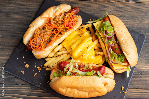 tree hot dogs with fries