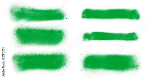 Green paint spray strokes brushes collection. Set of green brushes