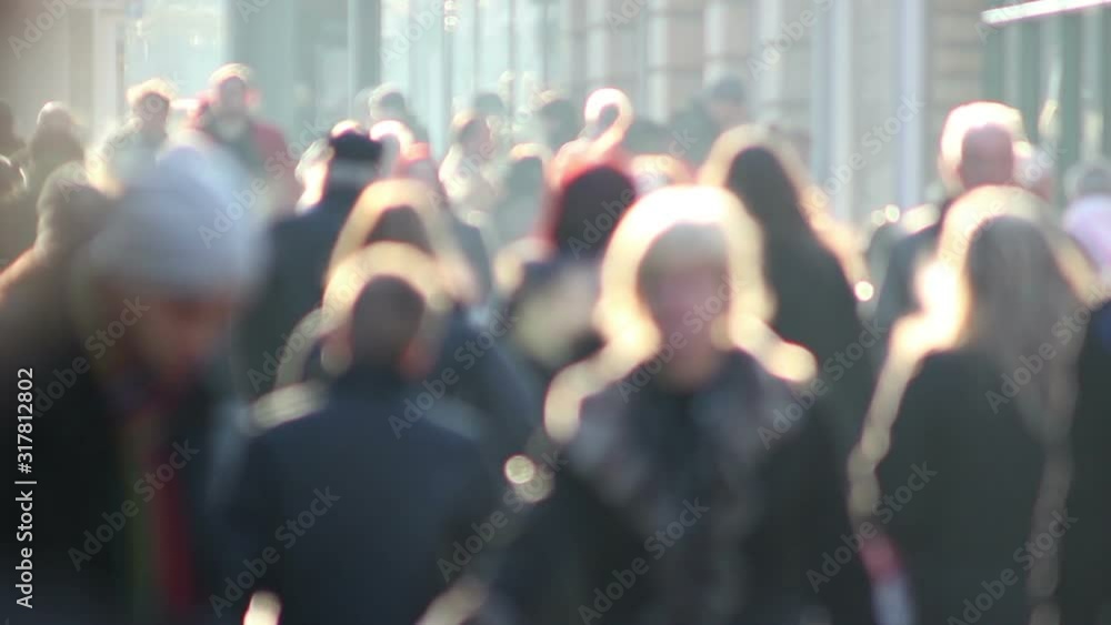 Anonymous / Unrecognisable People walking in the city. They are shopping and walking down the high street. Blurred on purpose Anonymous / Unrecognisable People walking in the city. They are shopping and walking down the high street. Blurred on purpose