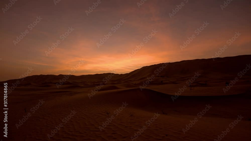 Timelapse of sunrise over sand dunes Timelapse of sunrise over sand dunes