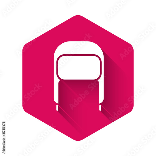 White Winter hat with ear flaps icon isolated with long shadow. Pink hexagon button. Vector Illustration