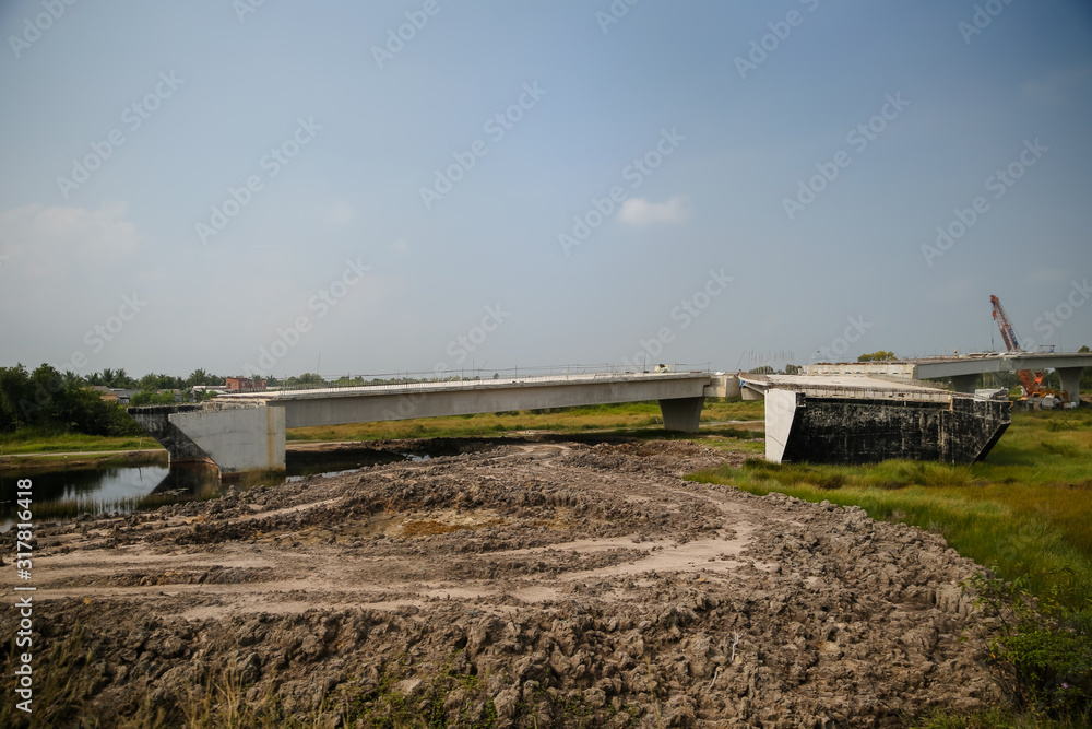 Highway overpass in a state of disrepair in Mekong Delta region of Vietnam Highway overpass in a state of disrepair in Mekong Delta region of Vietnam
