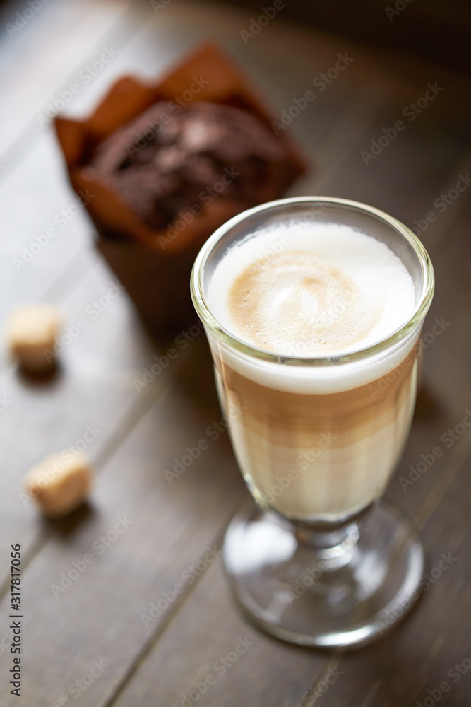 Caffe latte on brown background. Caffe latte on brown background.