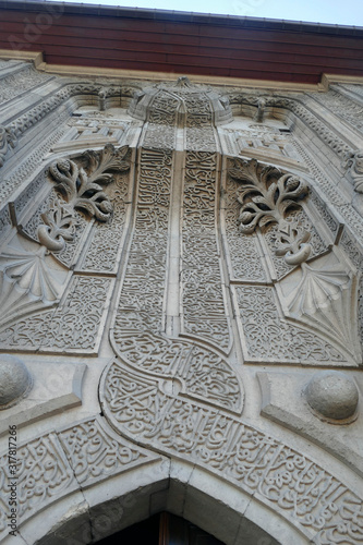 Distinctive Seljuk carved decorations on exterior photo