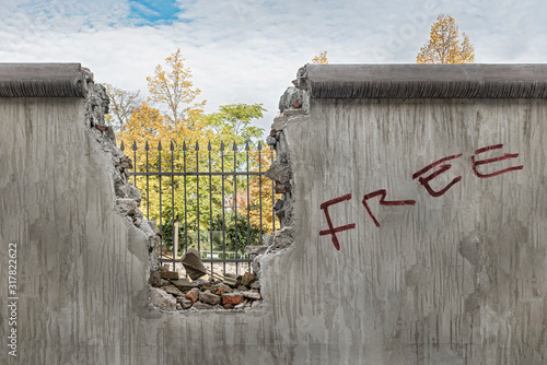 Political barricade that limits freedom. Broken wall that symbolizes freedom