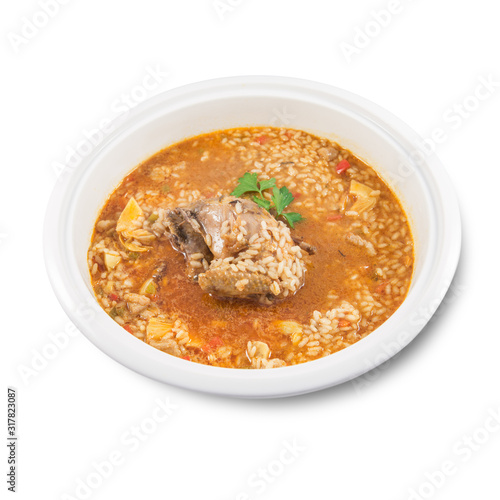 Dish of rice with partridge and artichokes © Esteban Martinena