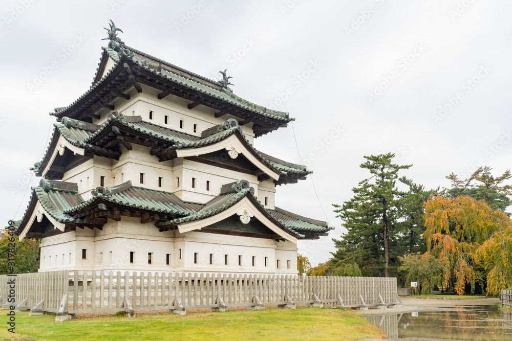 Exterior view of the Hirosaki Castle with beautiful fall color Exterior view of the Hirosaki Castle with beautiful fall color