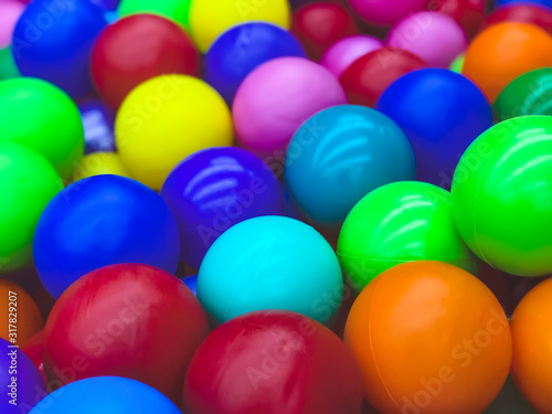 Bright multi-colored balls for the pool for childrens games.