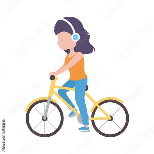 Fototapeta Naklejka Na Ścianę i Meble -  young woman with headphones riding bike