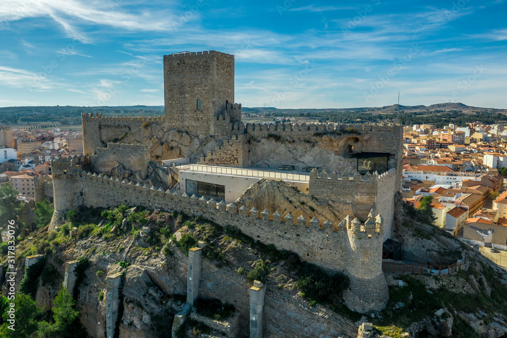 Aerial view of medieval Almansa castle with donjon and courtyard on a ...