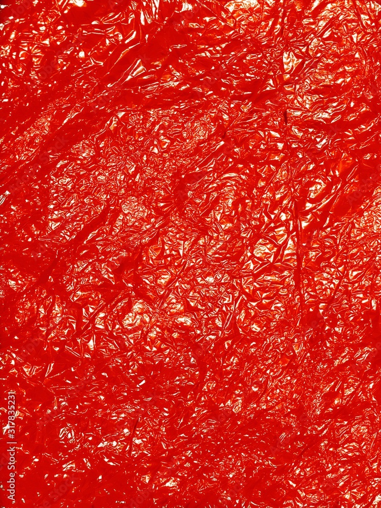 Lush lava color rumpled paper foil texture background. Lush lava color rumpled paper foil texture background.