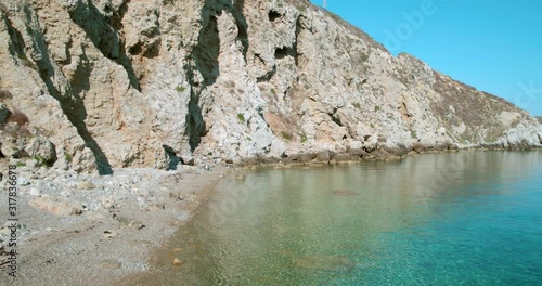 Pebble beach on the remote island of Palagruza in Croatian Adriatic photo