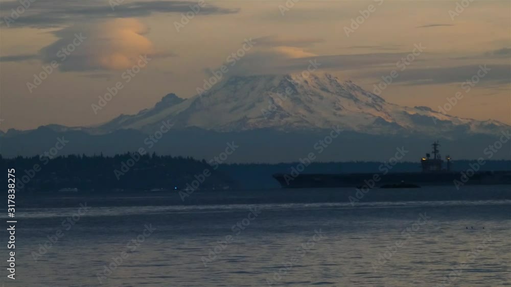 a large boat passing in front of mount rainier a large boat passing in front of mount rainier
