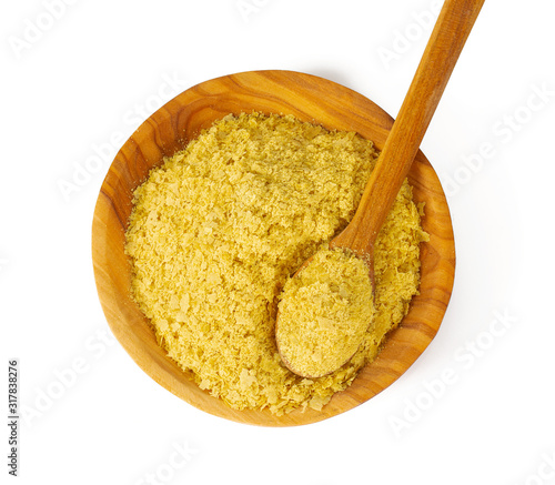 nutritional yeast flakes isolated on white background photo