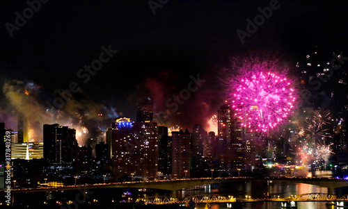 Coming in Happy New Year 2020   background sparks on fireworks colorful in the night sky. night beautiful for festival party.