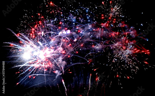 Coming in Happy New Year 2020 , background sparks on fireworks colorful in the night sky. night beautiful for festival party.