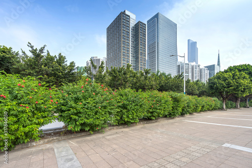 empty, modern square and skyscrapers in modern city