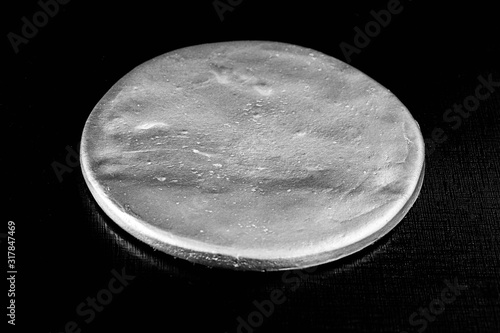 A highly enriched uranium billet. Original and without rotation. The enriched uranium is the one with high concentration of the U-235 variant Nuclear weapon, danger of war or nuclear conflict.